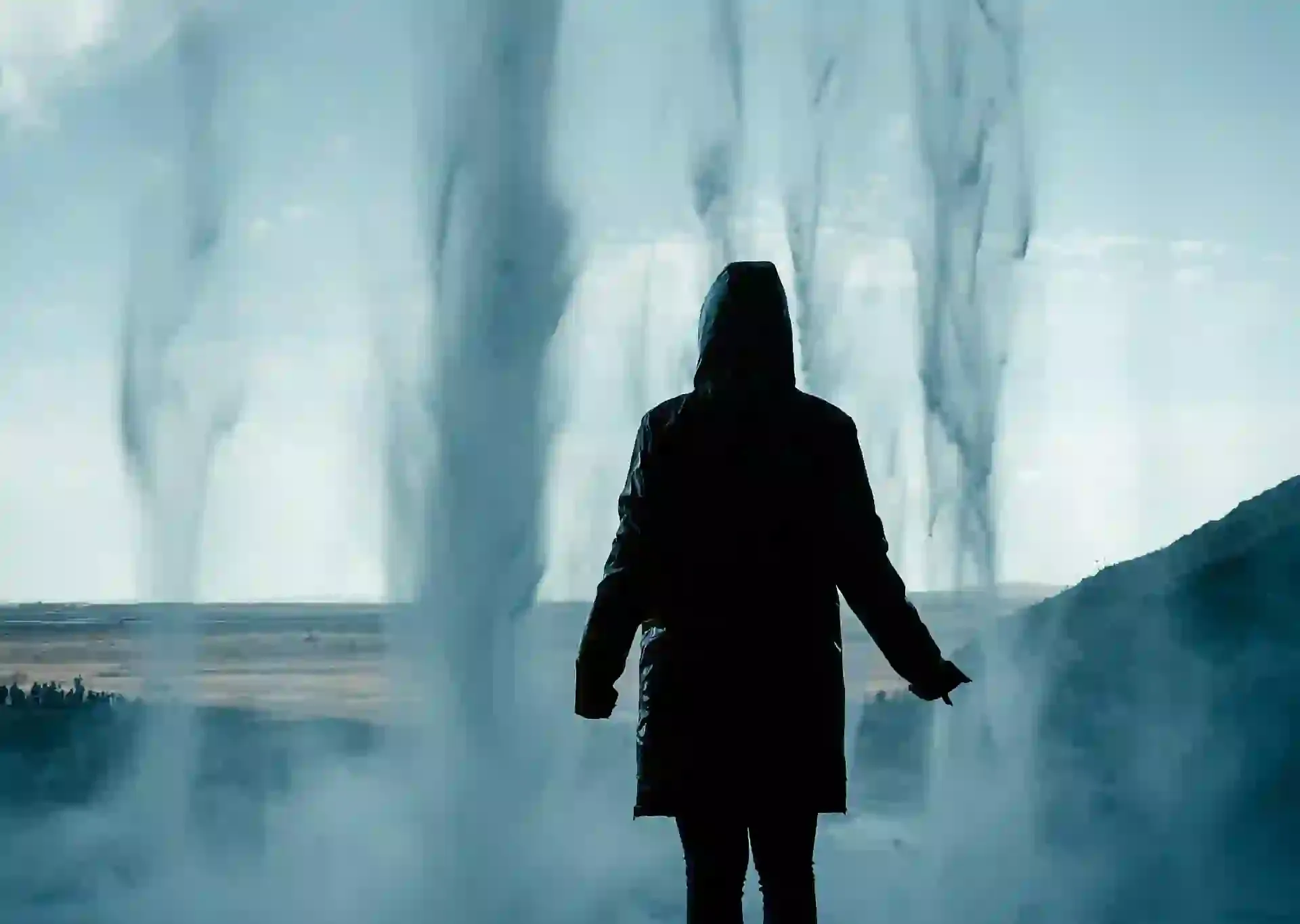 Person under a waterfall